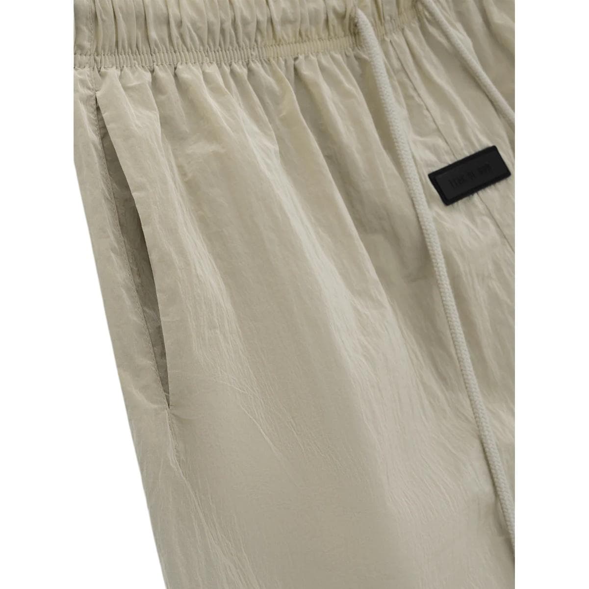 Шорты Fear of God Essentials SS24 drop2 Crinkle Nylon Running Short Logo GARDEN YELLOW - изображение 4