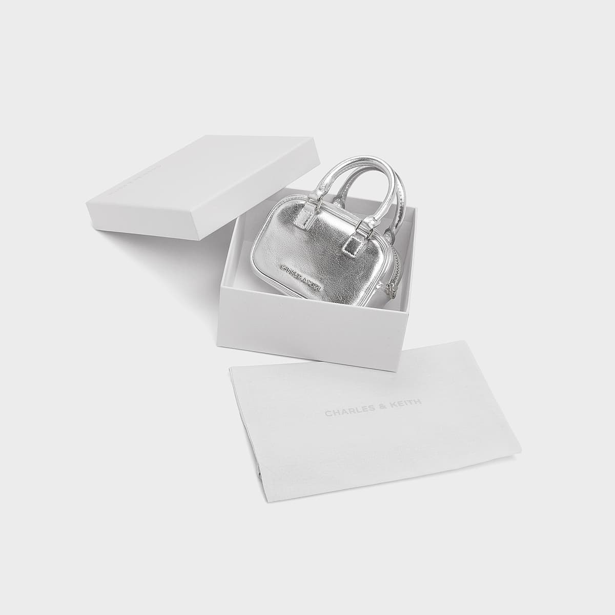 Сумка для наушников CHARLES&KEITH Мини-сумка на цепочке с чехлом для наушников PU Multi/Silver - изображение 10